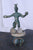 Figurine, Coins, and Bracelet